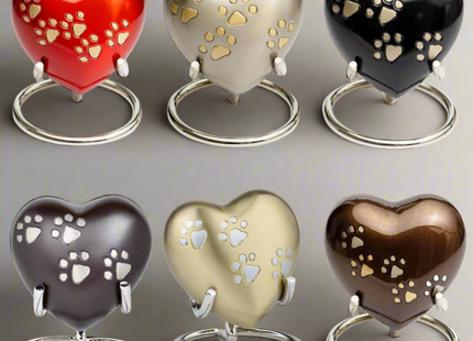 oyal Rapture Heart Urn in Pewter color with paw print for pet memorial.